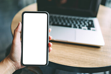 Women's hands holding cell telephone blank copy space screen. smartphone with blank white screen isolated on white background . smart phone with technology concept