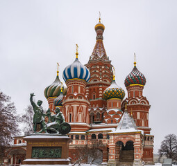 Fototapeta na wymiar St. Basil's cathedral and monument to Minin and Pozharsky on Red Square in Moscow, Russia, at winter