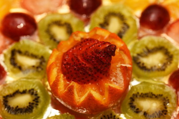 strawberries, kiwi ,grapes and oranges in gelatin