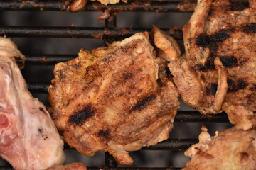 Grilling  steaks on barbecue grill in Bistrita,Romania