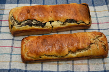 Romanian traditional sponge cake with Poppy Seed and Walnut Rolls