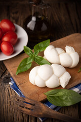 Twisted fresh Italian mozzarella Treccia. Italian soft cheese - 455627254