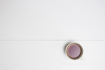 Coffee in a cup on a white table. 