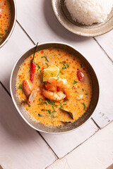 Asian food, spicy tom yum soup in a bowl