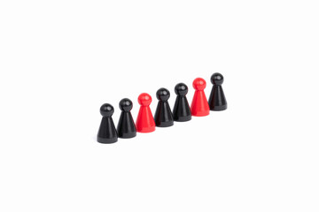 mixed team: red and black play figures stand in a row, white background