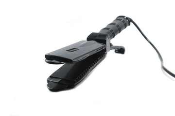 black curling iron is a beauty accessory of a woman who loves beauty in fashion and makes straight, beautiful hair a must-have accessory for young women at home.
