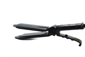 black curling iron is a beauty accessory of a woman who loves beauty in fashion and makes straight, beautiful hair a must-have accessory for young women at home.