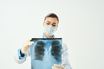radiologist with x-ray health care light background