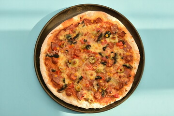Pizza four friends, with olives and salami