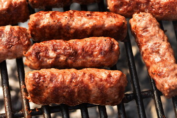 omanian barbecue ,mici, mititei, pork meat rolls