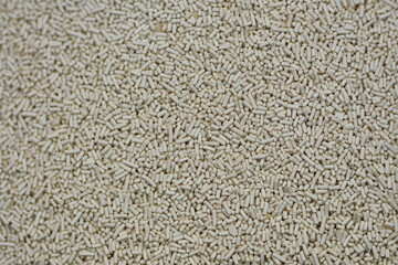 Pile of dry yeast isolated ,macro detail