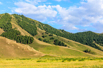 Beautiful mountain and clouds natural landscape in Xinjiang,China.