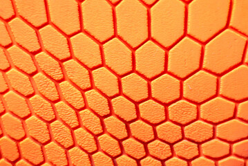 Orange hexagon pattern background Is a rubber decorated closeup.Orange hexagon abstract background texture.Macro shot.