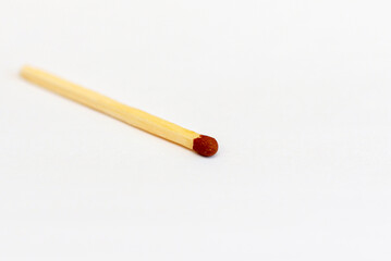 Closeup match on a white background with clipping path.matchstick flat lay,copy space,selective focus.