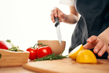 squeezing lemon juice into a salad cooking food kitchen ingredients