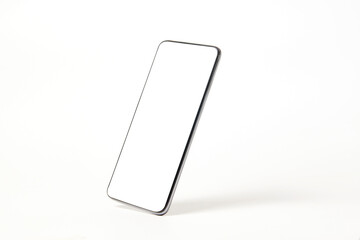Mobile phone with blank screen on white background