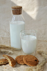 glass of milk and oatmeal cookies