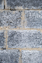 Сinder block wall background. Pattern of textured grey brick.