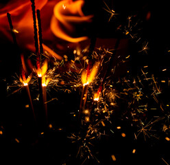 flame fire with sparks on black background
