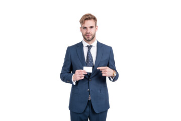 businessman in suit pointing finger on empty credit or debit business card, copy space, business.