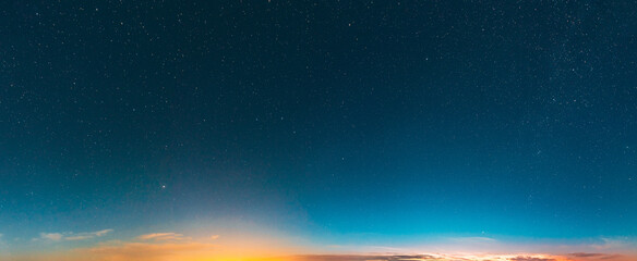 Real Colorful Night Sunset Sunrise Sky Stars. Night Starry Sky With Glowing Stars. Starry Backdrop Background. Panorama, Panoramic View