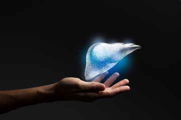 Aesthitic handdrawn illustration of human liver highlighted blue. Photo collage with female hand on...