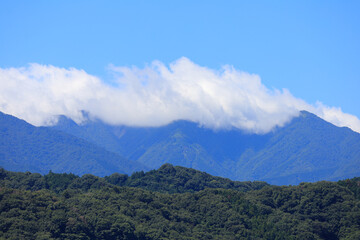 Fototapeta premium clouds over the mountains