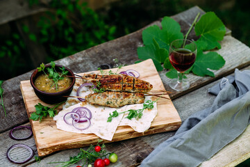 Lula kebab on pita bread with vegetables