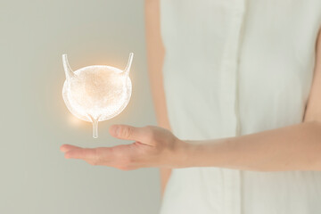 Woman in white clothes holding virtual bladder in hand. Handrawn human organ, detox and healthcare,...