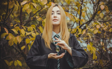 Halloween party and masquerade ideas, people outfit. Witch from school of wizards and magic
