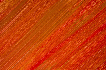 Abstract art background dark orange and red colors. Watercolor painting on canvas with ginger strokes and splash.