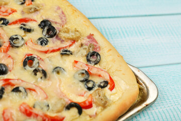 homemade fresh hot pizza is on wooden table top view
