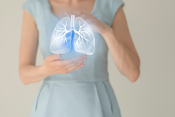 Woman in blue clothes, handrawn human lungs, healthcare service concept stock photo