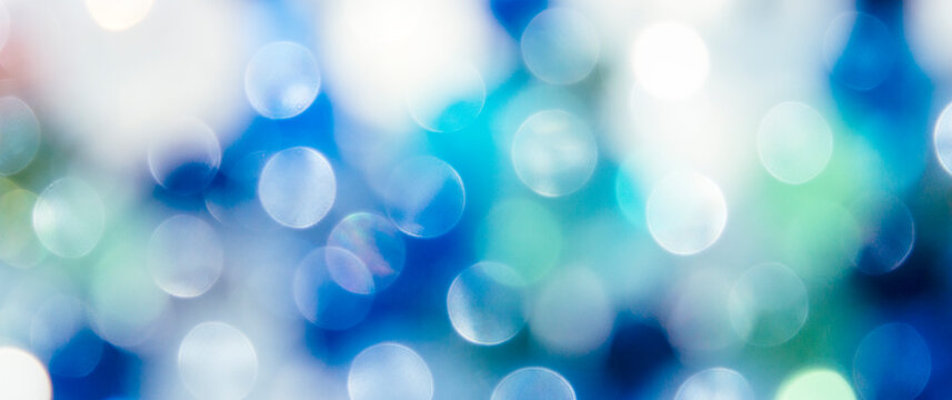 Bright blue-green abstract defocused background, round bokeh.