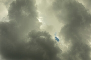 Gray clouds in the sky. Bad weather. Cold gray low clouds.