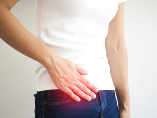 Woman with abdominal pain appendicitis. medical concept. closeup photo, blurred.