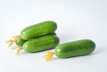 fresh cucumbers on a white background