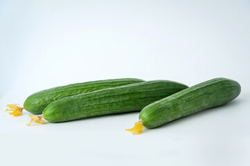 fresh cucumbers on a white background