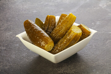 Marinated pickled cucumbers in the bowl