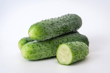 fresh cucumbers on a white background