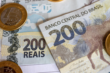 Brazilian money banknotes and coins. financial control