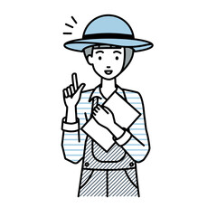 立って書類を手に持って何かひらめいた農家の女性