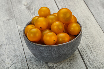 Fresh yellow cherry tomato heap