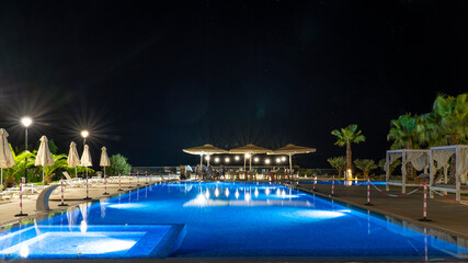 dinner beside the pool restaurant under the stars