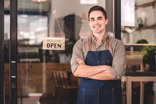 The coffee shop is open and male baristas are happy to serve you.