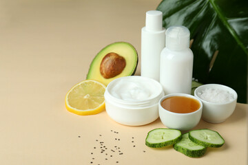 Natural spa cosmetics on beige background, space for text