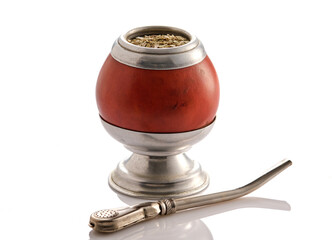 Mate yerba tea. Calabash and bombilla on white background. Traditional argentinian beverage