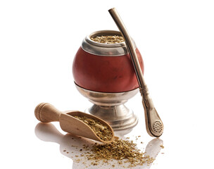 Mate yerba tea. Calabash and bombilla on white background. Traditional argentinian beverage