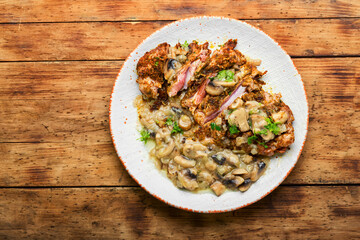 Turkey steak with fried mushrooms