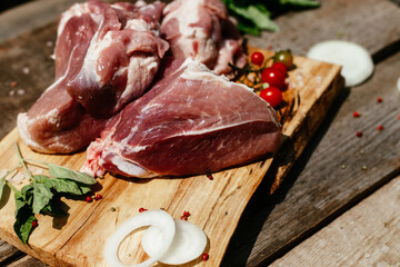 Pork pulp.raw piece of meat on a wooden board. 